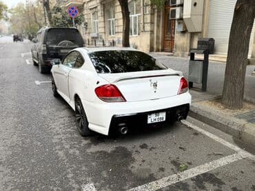 hunda h1: Hyundai Tiburon: 2 l | 2006 il Kupe — 5