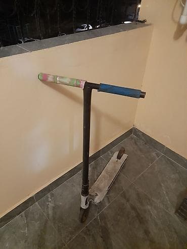 Freestyle skuter endirim var - T-formalı sükan: polad rəngli dirək