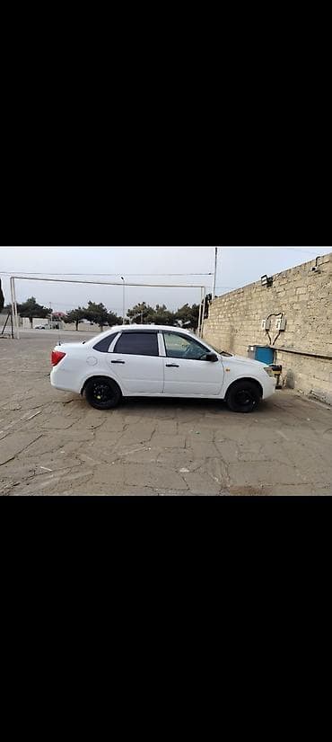 volkswagen passat b6: VAZ (LADA) Granta: 1.6 l | 2012 il 310000 km Sedan — 6