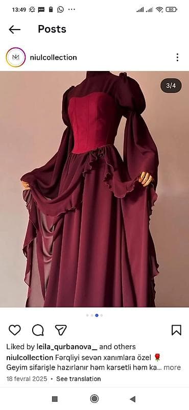 Bordo rəngli, romantik siluetli uzun libas. Modelin önündə formaverən — 2