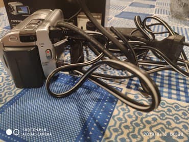 canon 1100 eos: Sony kamera, 80 gb daxili yaddaş, 60*Optical Zoom.Təzədir, bir-iki — 3