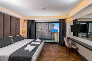 Гаражи: Müasir üslubda təchiz edilmiş bu otel otağı geniş yataq otağı və rahat — 8