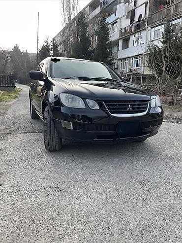 masin sat: Mitsubishi Airtek: 2 l | 2002 il 350000 km Krossover — 10