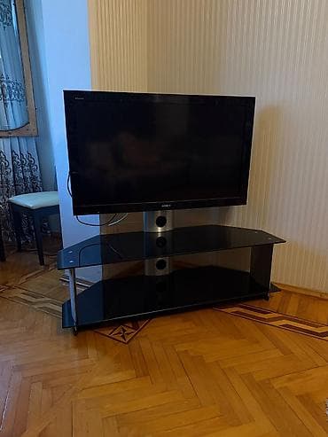 mini televizor: Məhsul: Sony Bravia LCD televizor + şüşə TV stendi (birgə) Televizor — 1