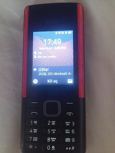 ucuz wifi modem: Sadə düyməli mobil telefon - Rəng: qara/qırmızı korpus - Ekran: kiçik — 1