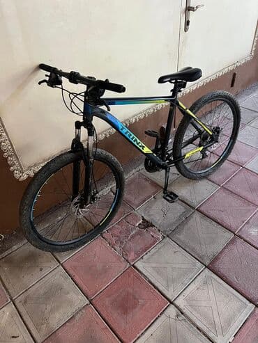 CD, DVD disklər və kassetlər: Dağ velosipedi Trinx, 26" — 6