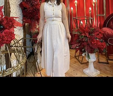 Ətək hissəsi kəsimli, qolsuz, krem rəngdə uzun kombinezon/şalvar-etek