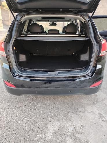 Hyundai Tucson: 0.2 l | 2009 il Krossover — 9