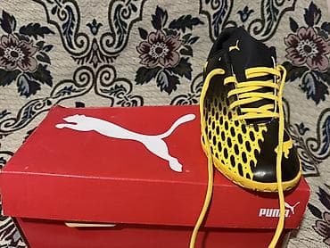 rezin bot: Puma futbol butsaları – sarı/qara rəng kombinasiyası Model kodu — 3
