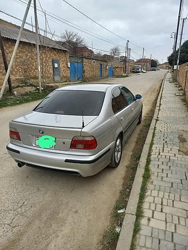disk: BMW 5 series: 2.5 l | 1999 il Sedan — 4