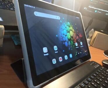 Planşet satılır, içərsində + klaviatura + siçan + kabro qələmi (