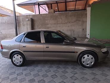 Çəngəllər: Opel Vectra: 1.8 l | 1996 il 193000 km Sedan — 6
