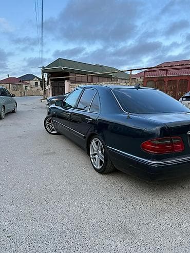 07 tekerleri: Mercedes-Benz E-Class: 2.3 l | 1997 il Sedan — 4