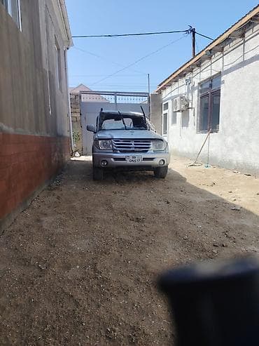 07 şekileri: UAZ Patriot, gümüşü rəng. Güclü off-road potensialına malik geniş SUV — 1