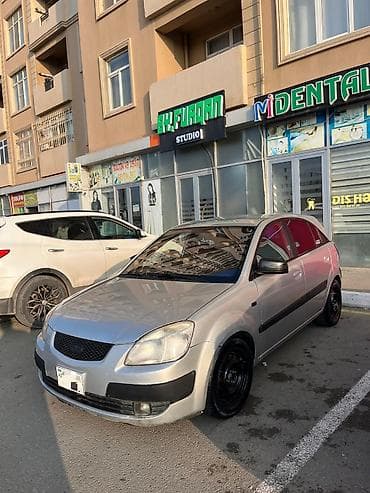 10 lt 663: Kia Rio: 1.5 l | 2008 il Hetçbek — 2