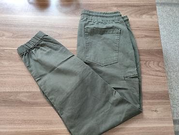 kisi hamam xalatlari: - Məhsul: Kişi şalvarı - Rəng: Xaki/yaşıl - Model: Elastik bel və iplə — 2