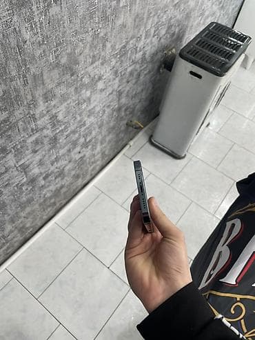 ucuz playstation 3: IPhone 12 Pro, 128 GB, Pacific Blue, Face ID — 6