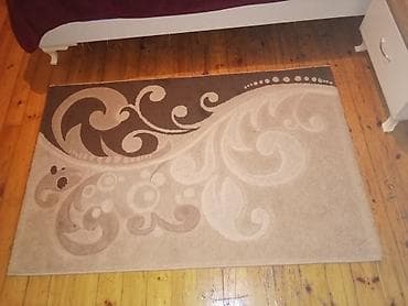 alon tekstil: Xalça – bej və qəhvəyi tonlarda naxışlı - Ölçü: təxminən 2 x 1,5 m — 1