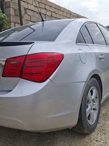 kia sorento 2015 qiymeti: Chevrolet Cruze: 1.4 l | 2014 il 286000 km Sedan — 7