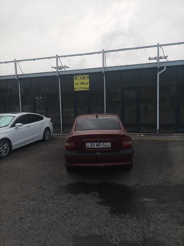 vaz 2106 abilsofka: Opel Vectra B sedan, tünd qırmızı rəng. - Kuzov: 4 qapılı sedan — 6