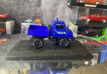 metbex tavan modelleri: Коллекционная модель Mercedes-Benz Unimog U411 Technical Relief blue — 13