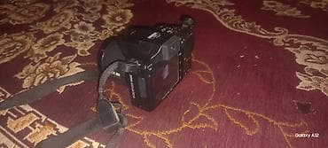 canon powershot a2300 is: Kodak EasyShare Z981 bridge fotoaparat - 26x optik zumlu — 3