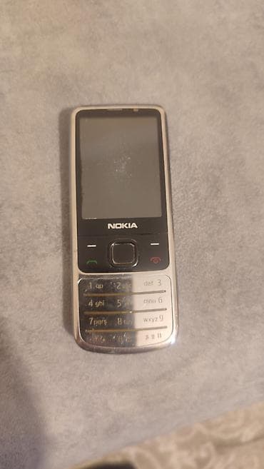 nokia e65: Nokia 1, 2 GB, rəng - Gümüşü, Düyməli — 2