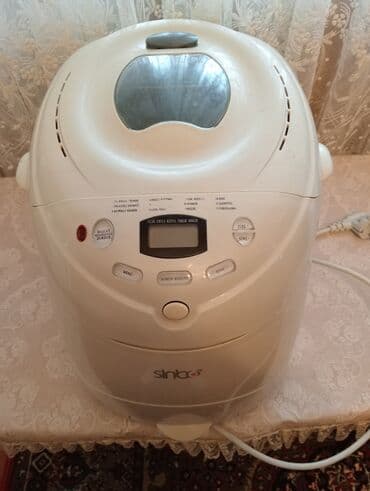 çörek biwiren: Çörek bişiren.özü xemir edir özü bişirir 2-3 defe işdenib tezedi 60m — 4