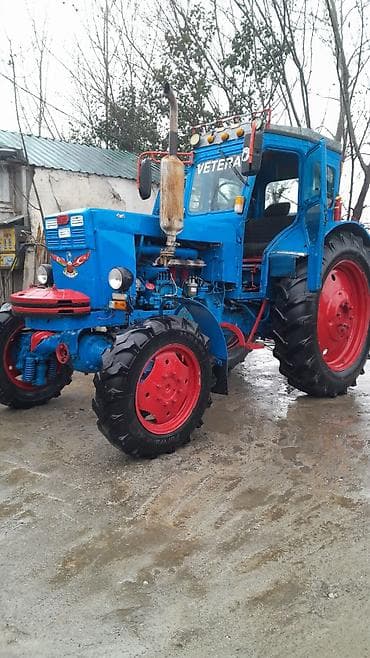 yeni maşınlar: Traktor “Veteran” – mavi/qırmızı rəng sxemi ilə tam komplekt qabaq — 1