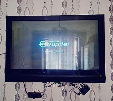 wifi modem: LG divar tipli televizor + Yupiter TV qutusu (IP/OTT set-top box) — 3