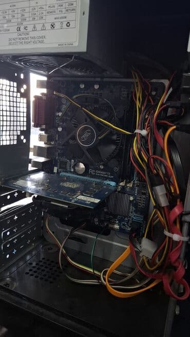 gtx 750 ti qiymeti: Masaüstü kompüter keysi Arxa panelində VGA, DVI, USB portları, səs — 2