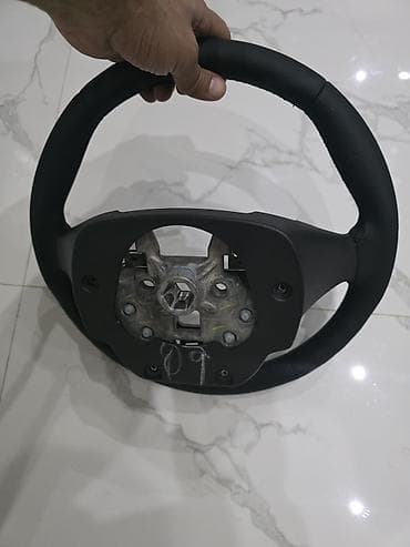 sukan lada: Avtomobil sükan çarxı - Material: Qara dəri üzlüklü sükan (tikişli) — 4