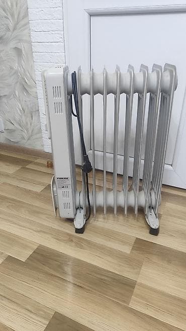 yağ radiyatoru: Nikai yağla doldurulan radiator – model NQH815N - Güc: 2000 W - — 1
