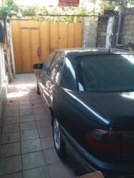 maşın üçün ətir: Opel sedan - Kuzov: 4 qapılı sedan, tünd rəng - Nömrə: AZ 90-DB-997 — 2