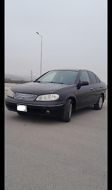 nissan sunny 2007: Nissan Sunny: 1.3 l | 2008 il Sedan — 3