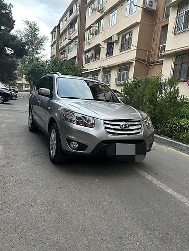 e 124: Hyundai Santa Fe: 2 l | 2010 il Ofrouder/SUV — 1
