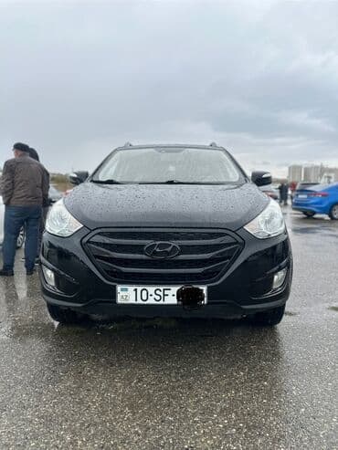 turbo az 06: Hyundai Tuscani: 2 l | 2010 il Krossover — 1