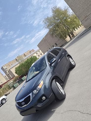 e 3 2: Kia Sorento: 2 l | 2010 il Ofrouder/SUV — 5