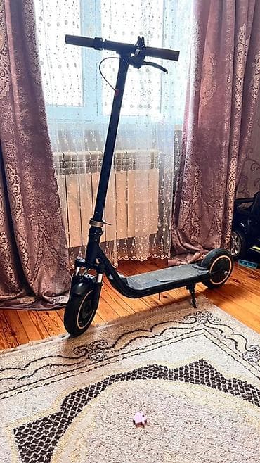 samkat: Elektrik skuter - Güclü ön amortizator sistemi – ikili yaylı çəngəl — 1