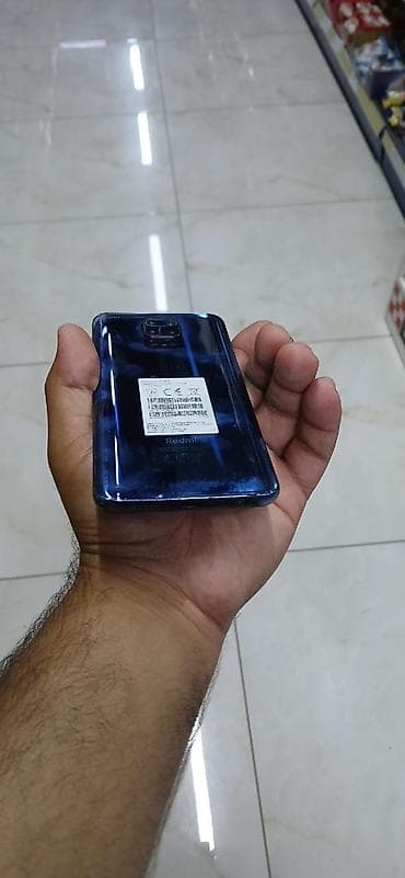 Xiaomi Redmi smartfon - Model: Redmi (arka qapaqda “Redmi” loqosu)