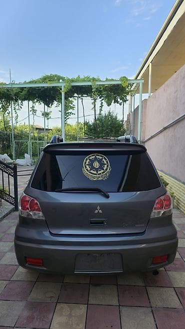 barter disk: Mitsubishi Outlander – boz rəngli, universallığı və rahatlığı ilə — 2