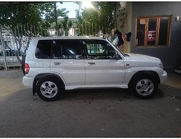 renault megane motoru: Mitsubishi Pajero iO (GDI) – 5 qapılı kompakt off-road SUV. il:2000 — 7