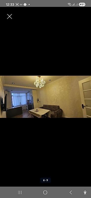 yeni yaşma: Yeni tikili binada 2 otaqlı mənzil (studia tipli zal + ayrıca yataq — 4