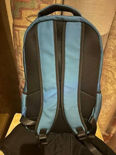 qruz nə deməkdir: Mavi rəngli uniseks bel çantası.Çantanın ön hissəsində əlavə cib, əsas — 2