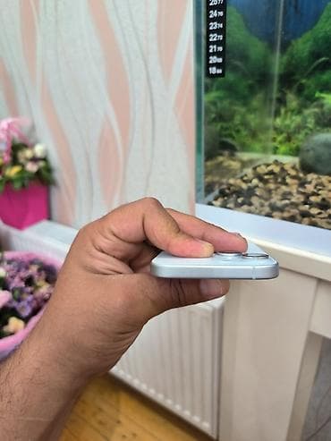 IPhone 15, 256 GB, Pacific Blue, Face ID — 7