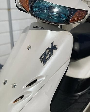 changan benni kreditle: Honda Dio ZX scooter - Model: Honda Dio ZX (AF35 seriyası loqosu — 5