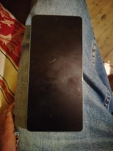 iphone 6s pulus: Redmi smartfon - Arxa kamera sistemi: Üst hissədə iri ikili modul və — 2