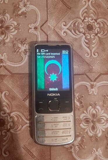 Lincoln: Nokia 6700 Slide, 2 ГБ, цвет - Серебристый, Кнопочный — 1