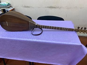 saz: Saz – uzun qol, armud formalı korpuslu, çoxsimli milli simli musiqi — 1