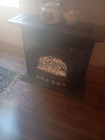 Samovarlar: Klassik dizaynlı bürünc/çuqundur tonlarında soba-kamin. Otağı həm — 1